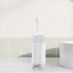 Máy tăm nước mini IPX7 chống nước cho gia đình du lịch